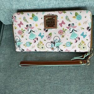 Dooney and Bourke wristlet. 8.25x4.75x1 inches.